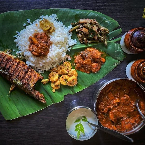 Kerala meal on a banana leaf at Rahaf Cafeteria, UAE, a FoodChow online ordering and POS customer